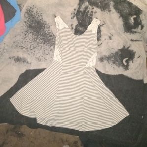 Dress with side lace cutouts